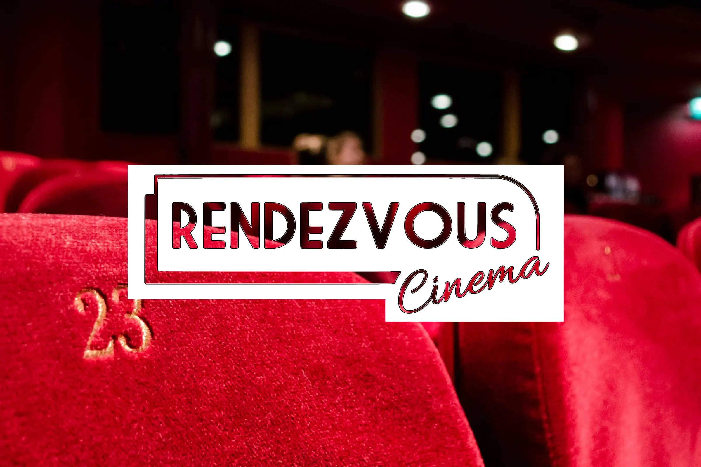 The Rendezvous Cinema logo over rows of red velvet cinema seats
